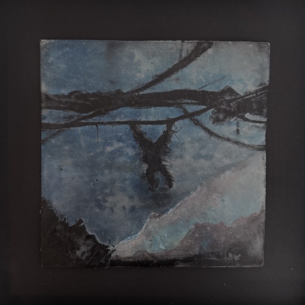 Dark, rough-textured figure hanging by the arms from a branch against a night sky. Original artwork “Wild Swing” by Andi Ipaktchi, used as header image for the text “Platonic Idiocy” by Caspar Schjelbred.